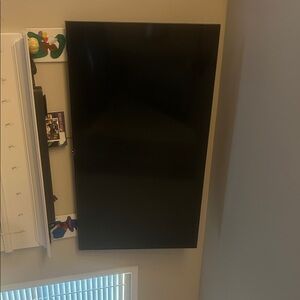 Sleek Black Flat Screen TV